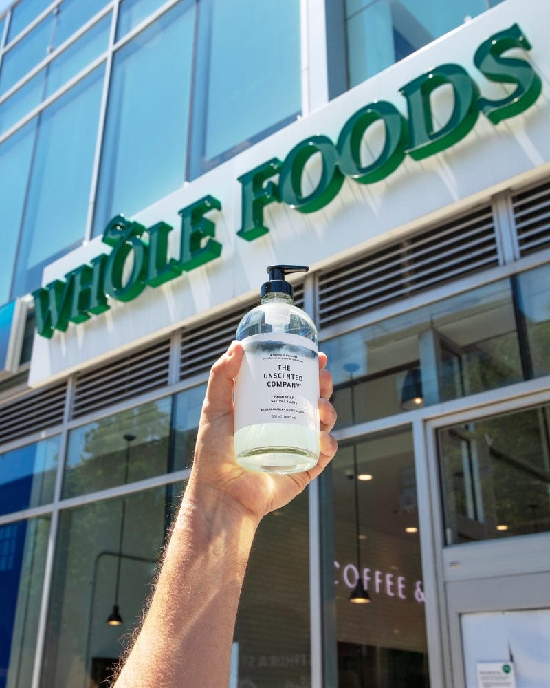 The Unscented Company hand soap in front of a Whole Foods store.