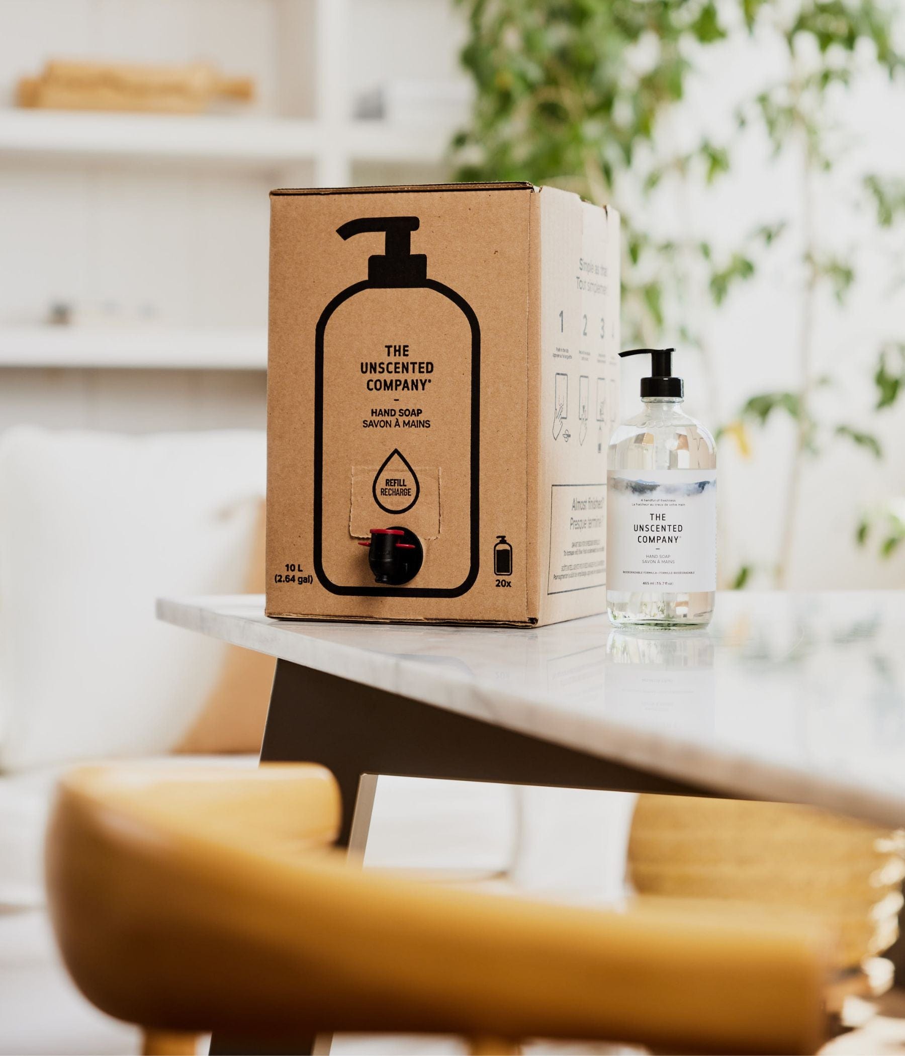 The Unscented Company hand soap refill box and bottle on a table