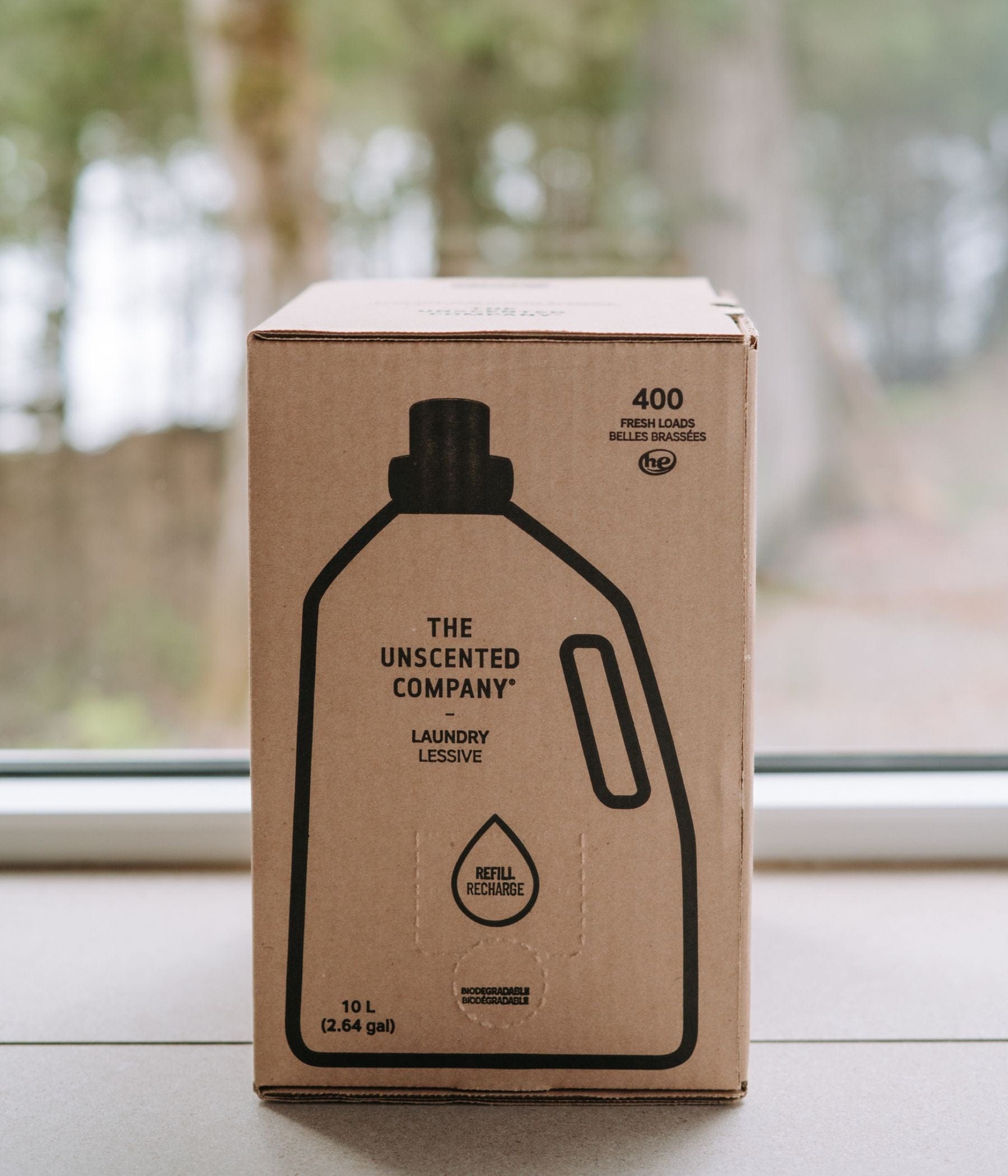 The 10L Laundry refill box in front of a window.