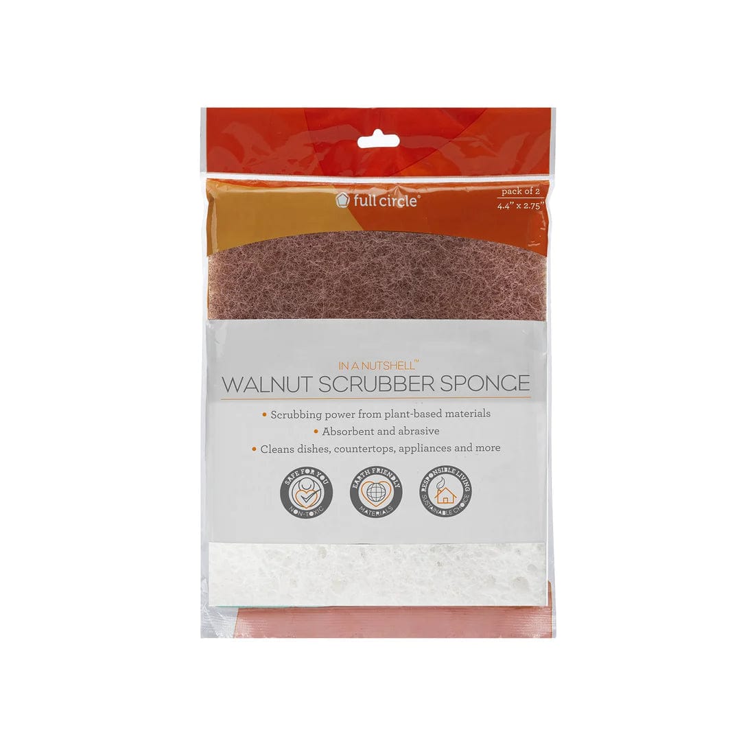Walnut scrubber sponge made from plant-based materials, designed for cleaning dishes, countertops, appliances, and more.