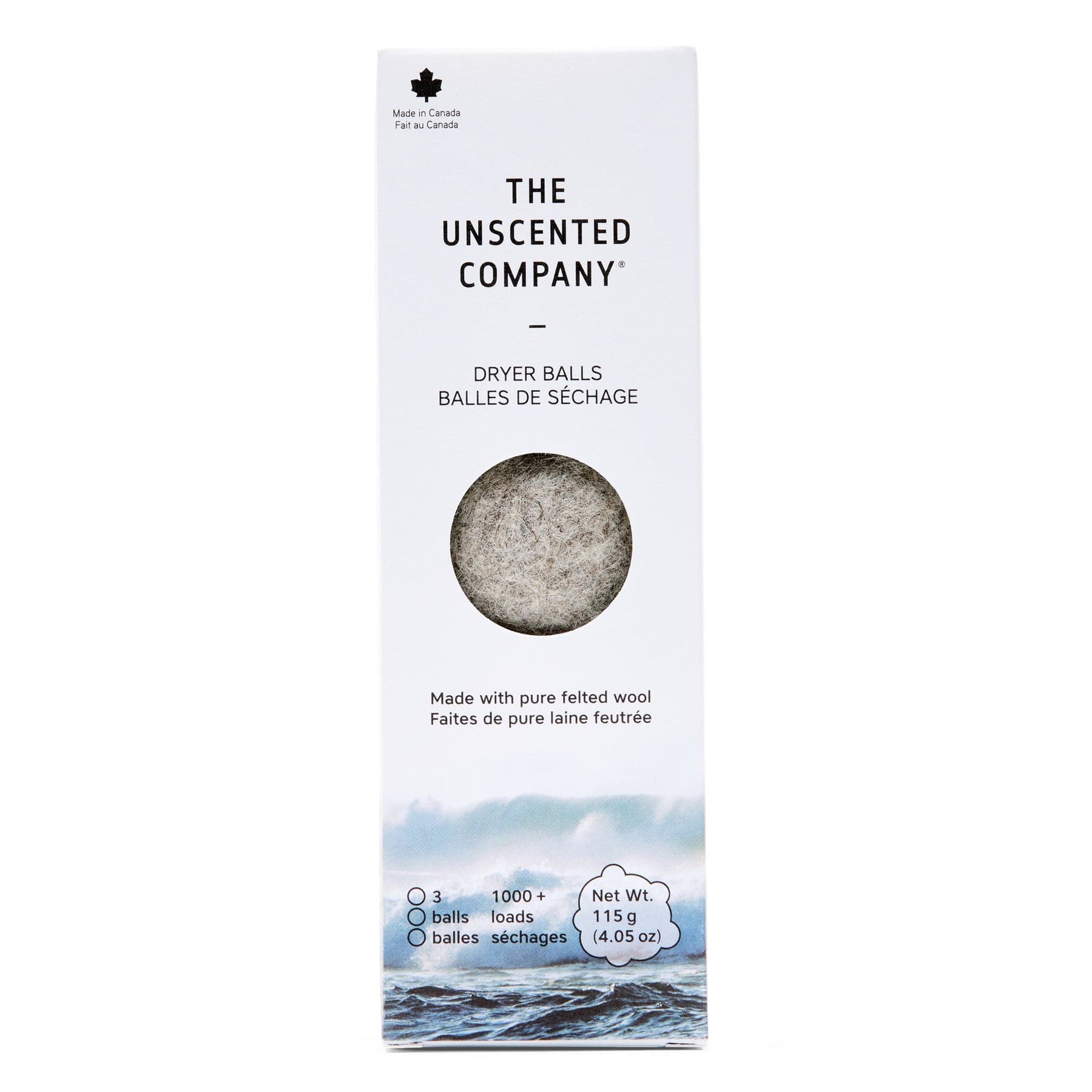 The Unscented Company dryer balls package with a window showing the wool balls inside.