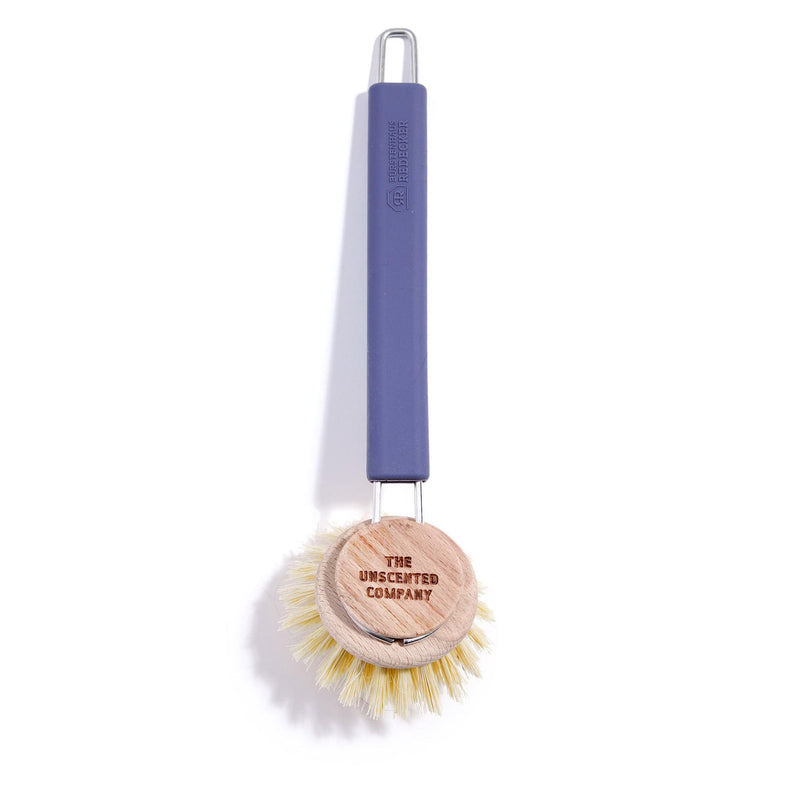 The Unscented Company dish brush with natural bristles, wooden head, and blue handle.