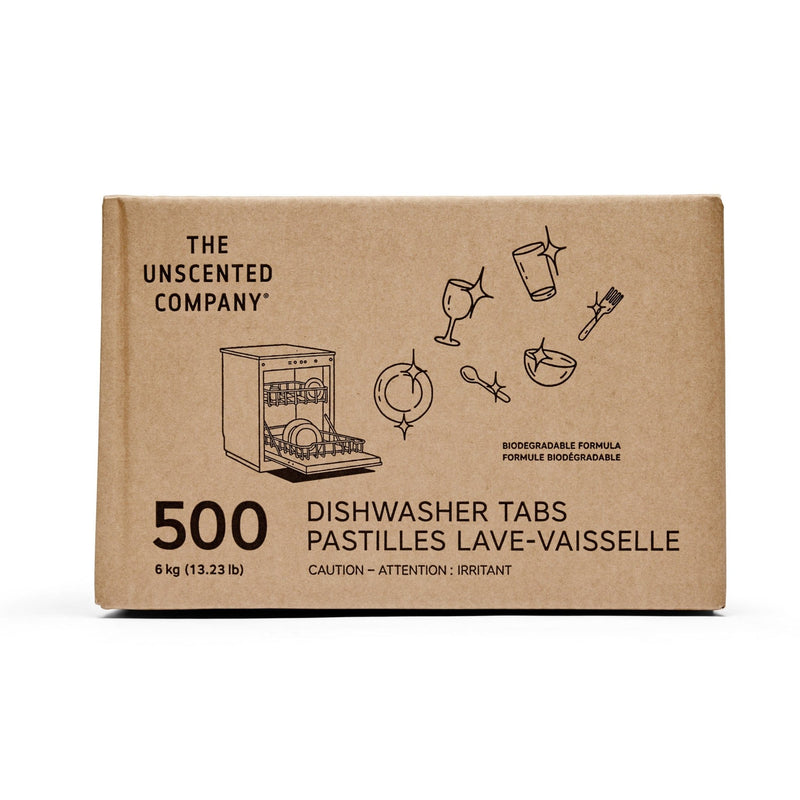 Brown cardboard box of The Unscented Company dishwasher tabs, labeled “500 dishwasher tabs – 6 kg (13.23 lb) – biodegradable formula,” with simple black line drawings of clean dishes and utensils.