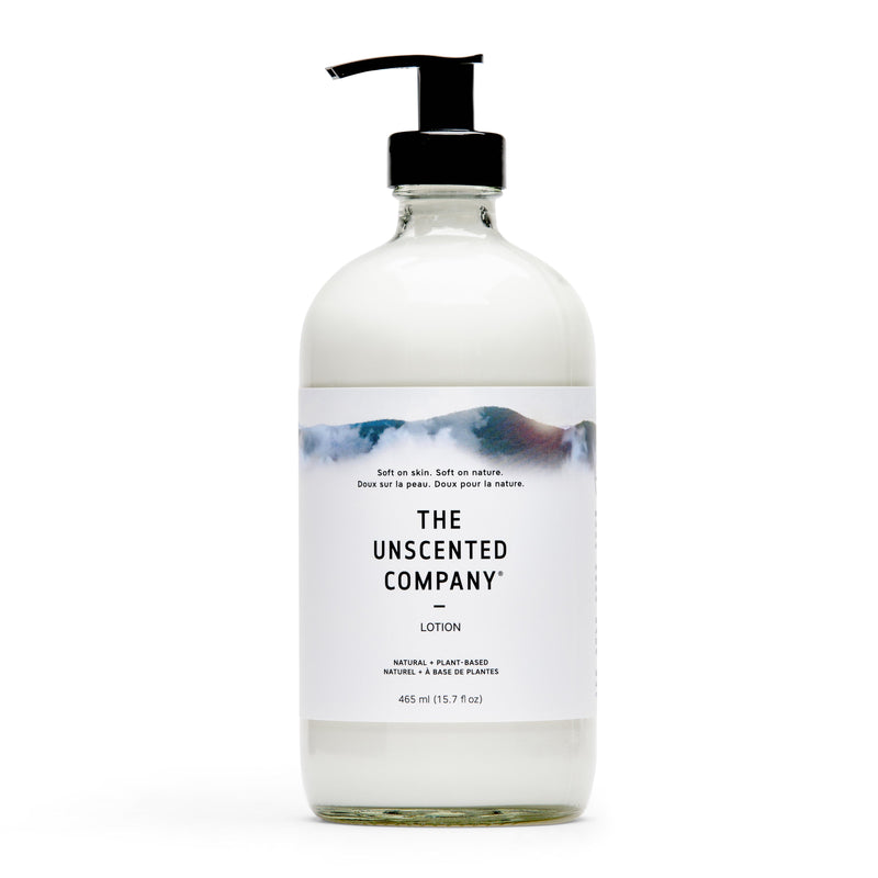 Front of The Unscented Company lotion bottle with soft nature design.