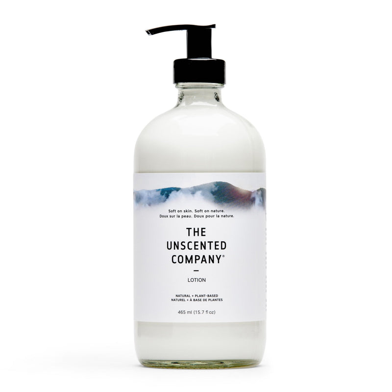 Front of The Unscented Company lotion bottle with soft nature design.