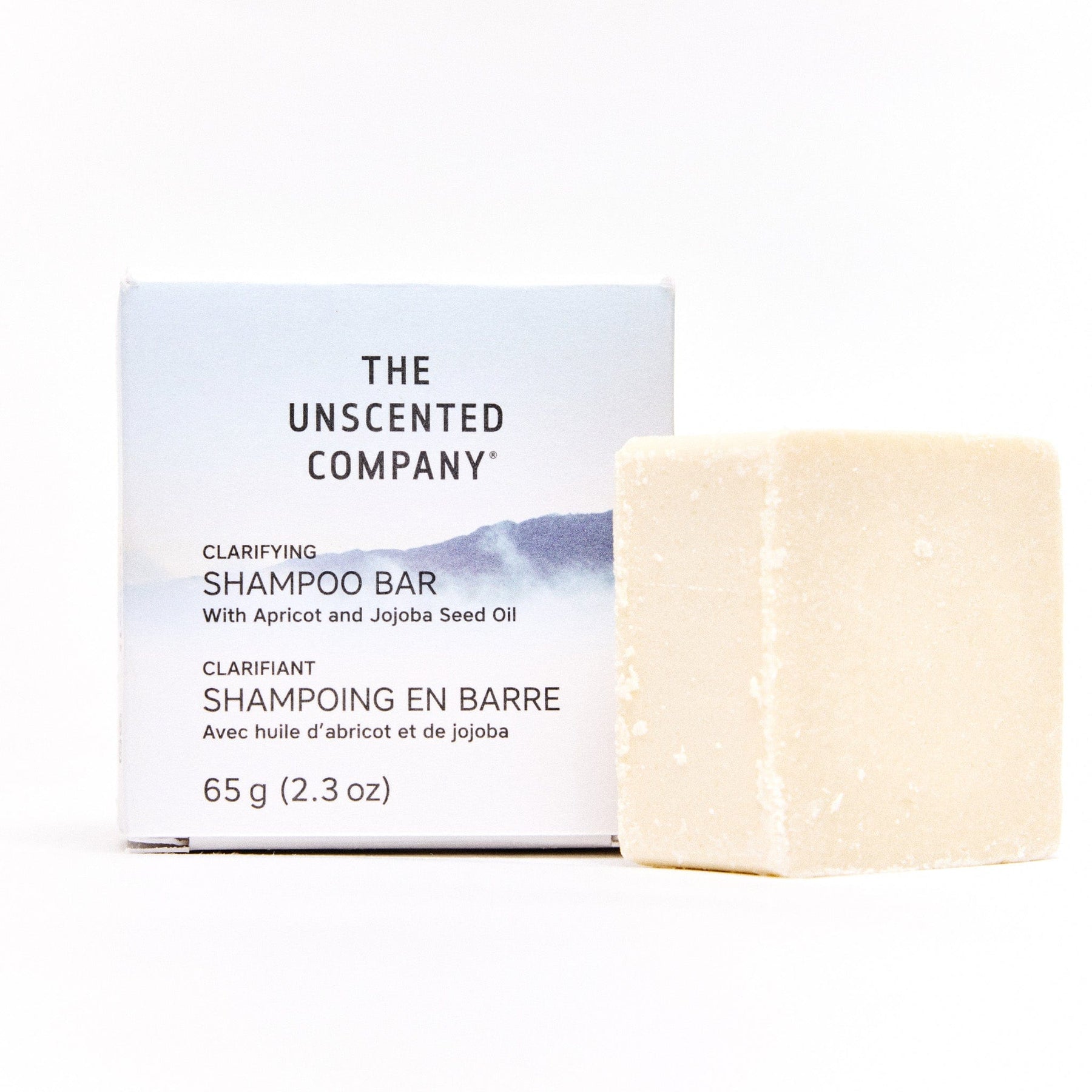 The Unscented Company Clarifying Shampoo Bar displayed next to its box, showcasing the bar’s texture and packaging.
