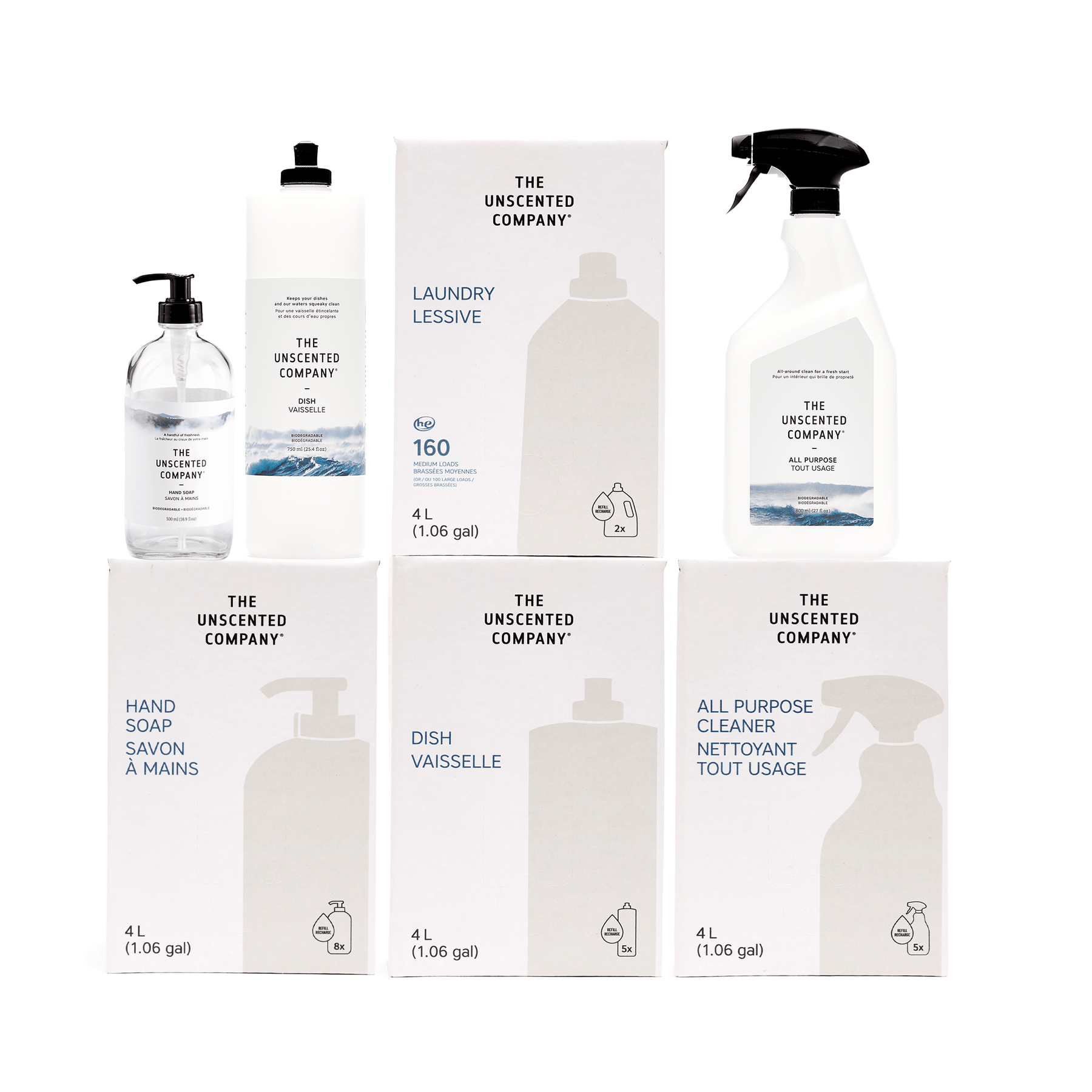 A collection of eco-friendly cleaning products from The Unscented Company, including large 4L refill boxes of hand soap, dish soap, all-purpose cleaner, and laundry detergent, alongside a spray bottle, a pump bottle, and a laundry jug.