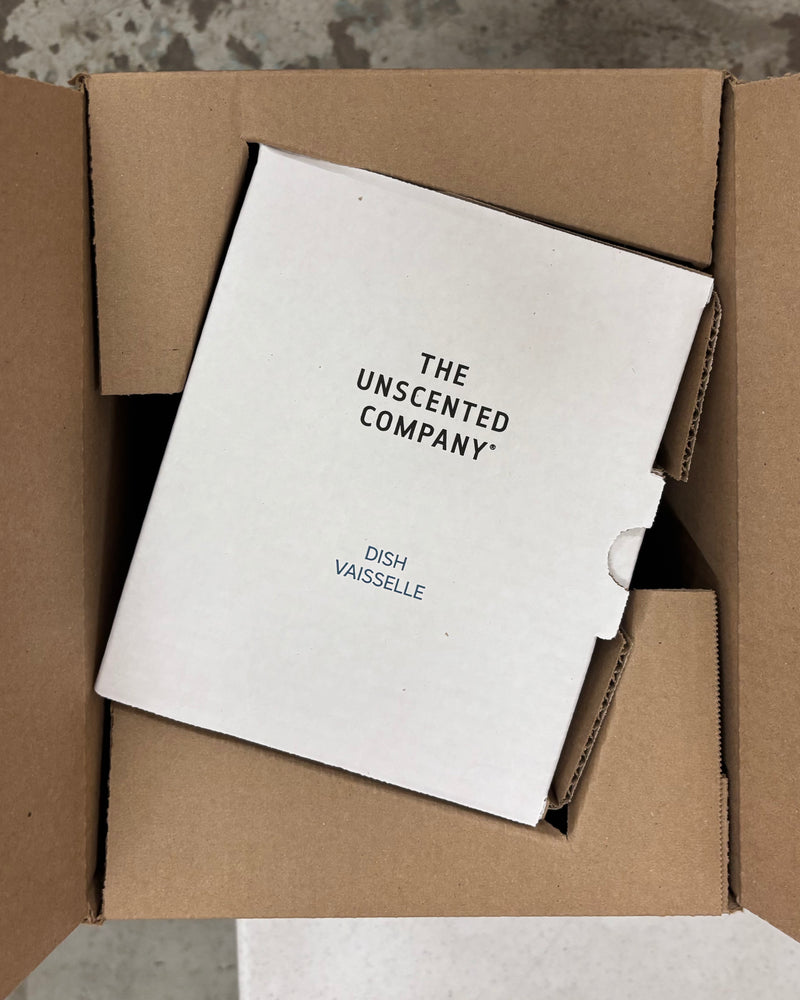 The Unscented Company redesigned eco-friendly packaging for dish soap, using a compact recyclable box to reduce paper waste and material use, highlighting a sustainable shipping solution and low-impact, zero-waste approach to household products.