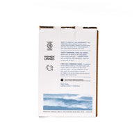 Back view of The Unscented Company 4 L all-purpose cleaner box featuring ingredient list, safety instructions, B Corp and Women Owned certifications, and ocean wave imagery on minimalist white packaging.
