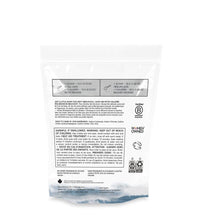 Back of The Unscented Company delicate laundry detergent bag showing usage instructions, safety warnings, ingredient list, and certifications, on a white background.