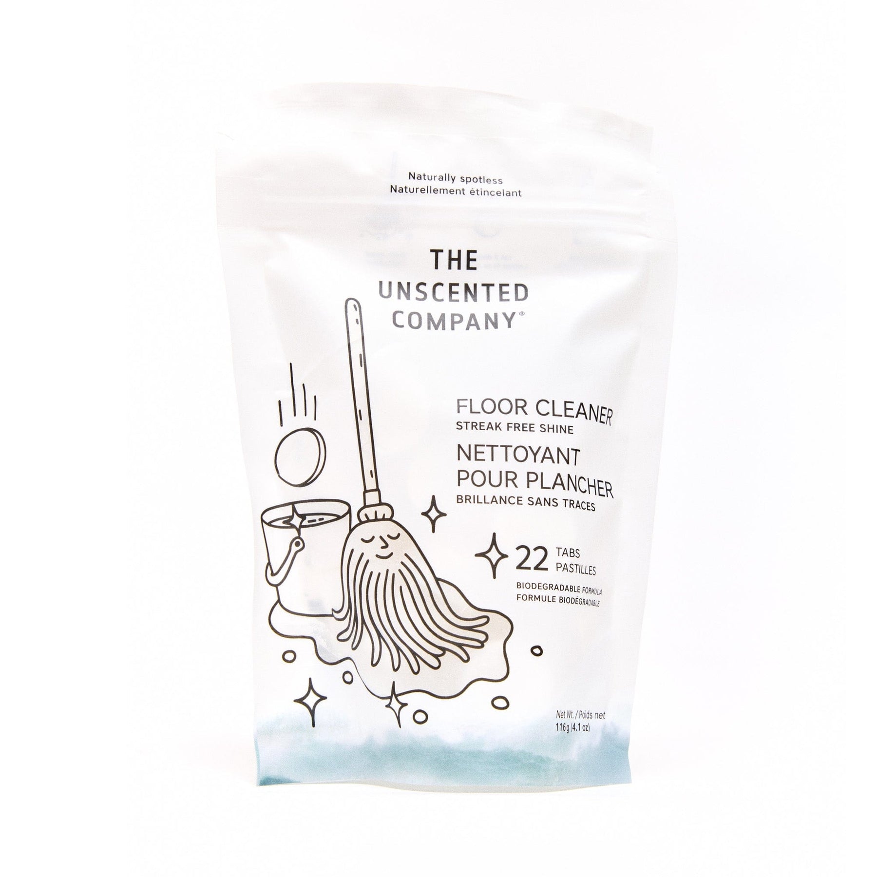 A white resealable pouch of The Unscented Company floor cleaner with illustrated mop, bucket, and sparkle icons. Text reads “22 tabs” and “biodegradable formula.” Two white cleaning tablets lie in front of the pouch.