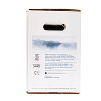 Back view of The Unscented Company 10 L hand soap box, showing ingredients, safety information, certifications, and sustainability icons on minimalist white eco-friendly packaging.