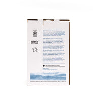 Back view of The Unscented Company 4 L laundry detergent box, showing ingredients, safety instructions, certifications, and ocean wave graphic on minimalist white eco-friendly packaging.