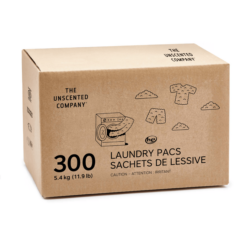 Brown cardboard box of 300 laundry pacs from The Unscented Company, featuring black illustrations of clothes, clouds, and a washing machine on the front. The simple design reflects a natural and minimalist aesthetic.