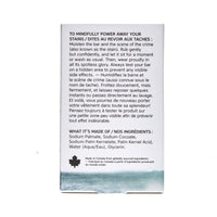 Back of The Unscented Company stain remover bar packaging, featuring bilingual usage instructions, ingredient list, and B Corp and Women Owned certifications.