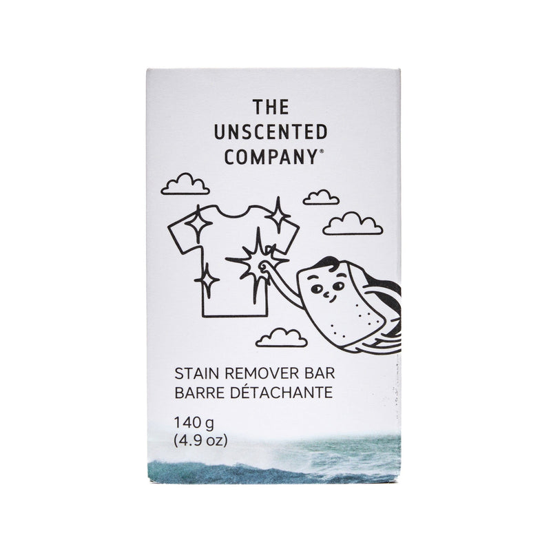 Front of The Unscented Company stain remover bar packaging, illustrated with a sparkling clean t-shirt and a soap bar character, with “Fragrance-free”, “Never tested on animals”, and “Vegan” labels on the side.