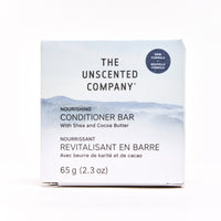 White background packshot of The Unscented Company nourishing conditioner bar with shea and cocoa butter.